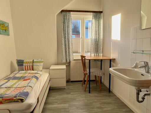 Ferienhaus Norderney - Schlafzimmer oben 